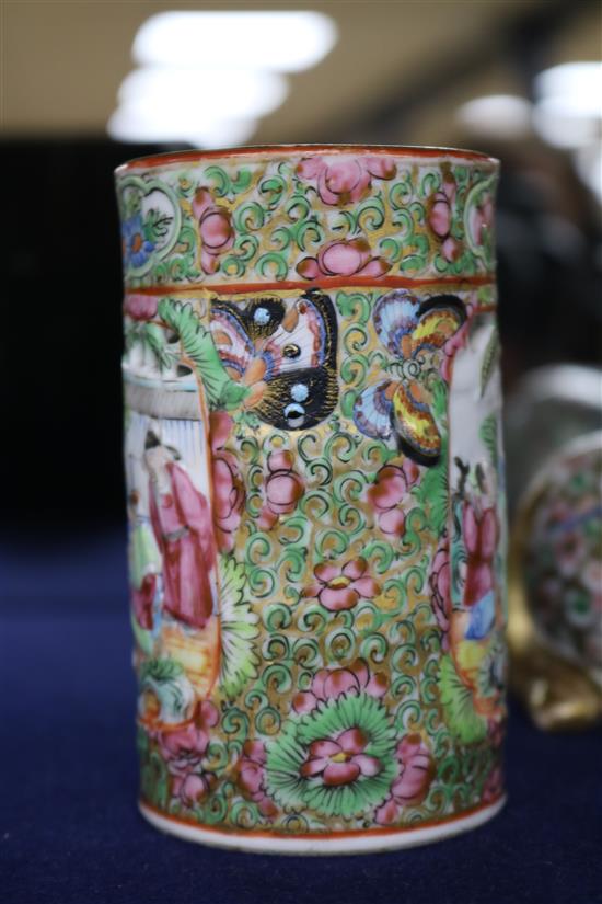 A Japanese Kutani porcelain lion dog candlestick, enamelled and gilt decoration and a Canton vase candlestick height 10cm